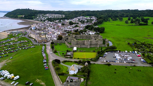 Aerial view of Beaumaris Castle, the town and the Menai Strait