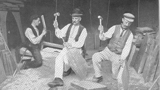 Quarrymen splitting slate at Dinorwig Quarry around 1910