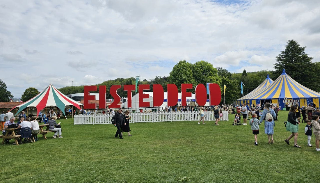 National Eisteddfod entrance sign and festival tents on the Maes