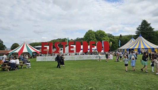 National Eisteddfod entrance sign and festival tents on the Maes