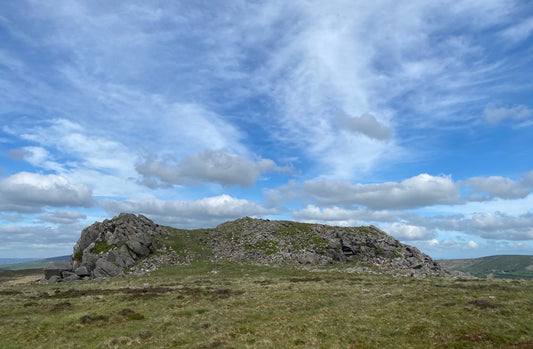 Rocky outcrop beneath a blue sky in the Preseli landscape