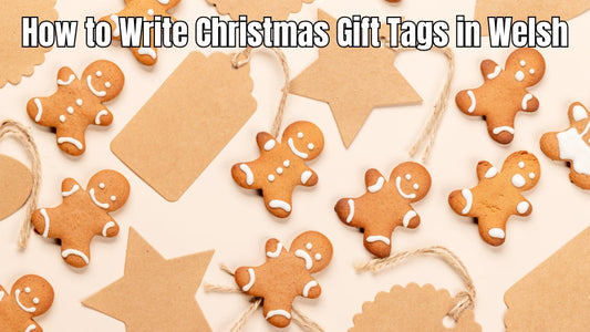 Welsh-language Christmas gift tags on wrapped presents.