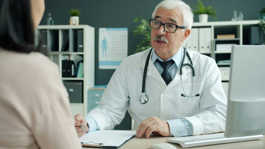 A patient discussing health concerns with a doctor during an appointment