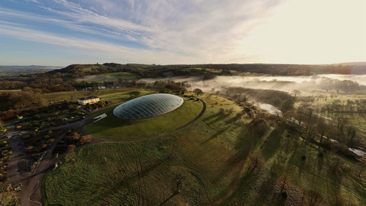 Aerial view of the Great Glasshouse and parkland at the National Botanic Garden of Wales