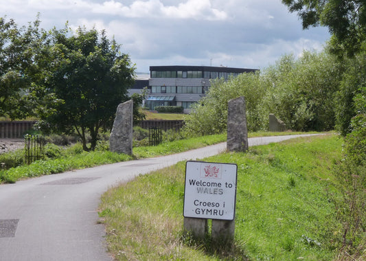Wales Coast Path starting point sign beside the route at Queensferry