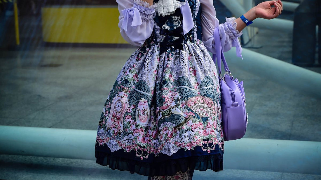 Cosplayer in an elaborate purple costume at a comic convention