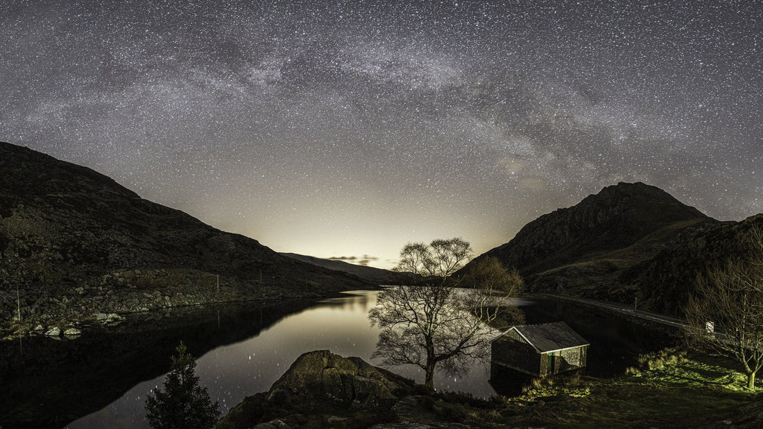 The Milky Way over Llyn Ogwen in Eryri at night.