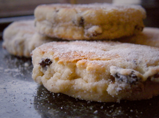 Freshly cooked Welsh cakes dusted with sugar
