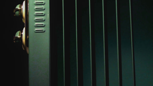 Close view of a home radiator glowing in warm light